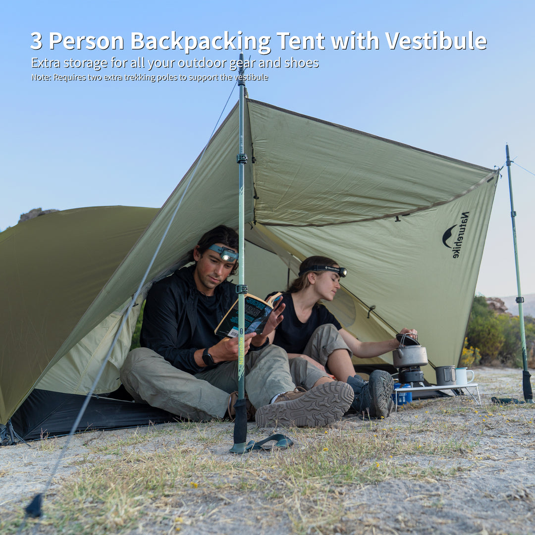 Naturehike Mongar Pro 3-Person ultralight backpacking tent in real outdoor scene with two people sitting inside the inner tent, featuring a spacious vestibule that offers extra storage for outdoor gear and shoes, freestanding double wall hiking and trekking tent ideal for three person camping and extended backpacking adventures