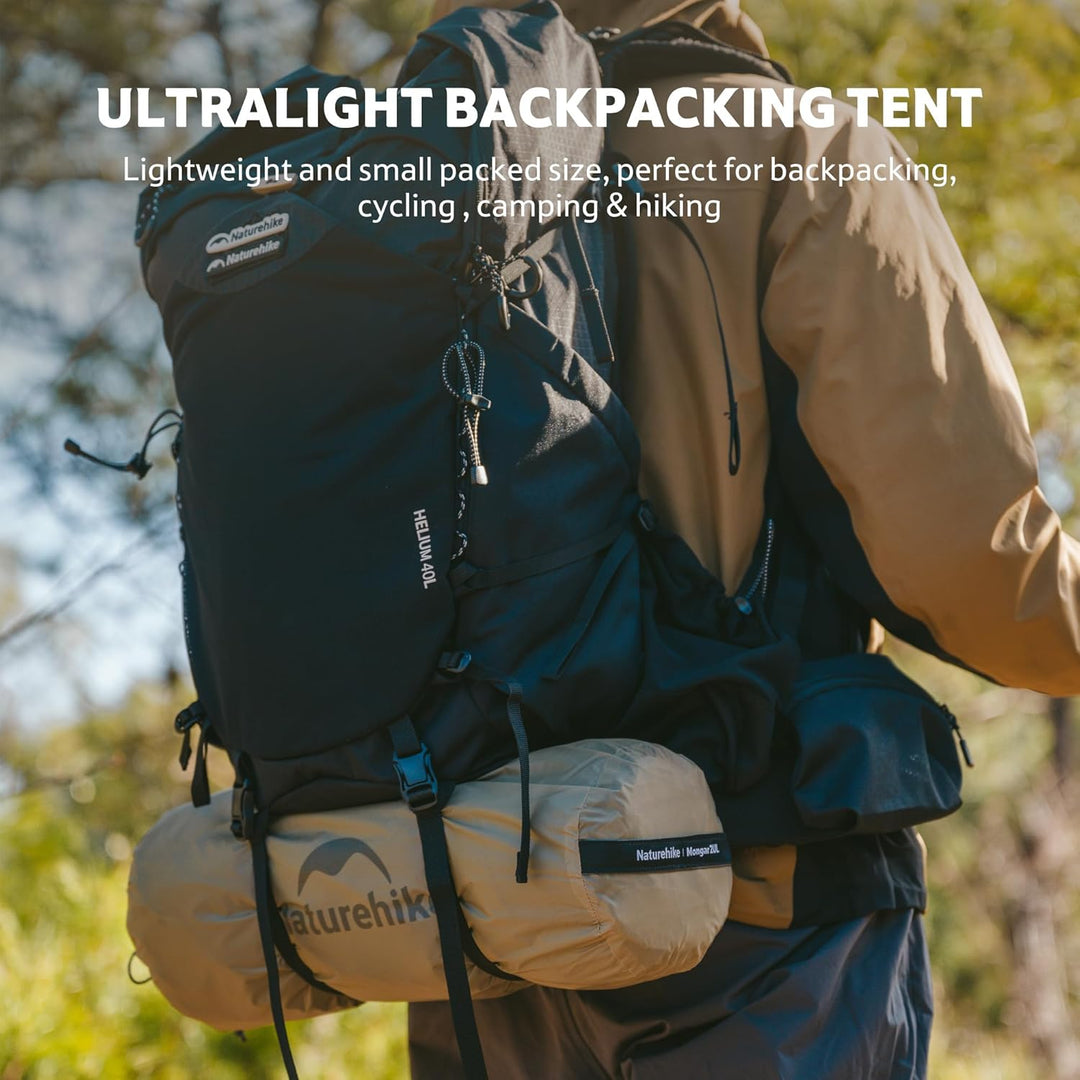 Hiker carrying a backpack with compact and ultralight Naturehike Mongar UL 1 person tent attached, ideal for backpacking, hiking, and cycling trips, small and easy to carry.