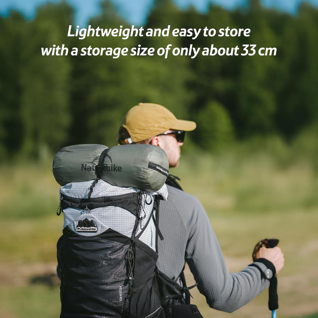 Naturehike Summiture UL 2 tent stored on a backpack outdoors, showing lightweight and easy-to-store design with a storage size of only about 33cm, ideal for hiking, backpacking, and best lightweight tents on sale.