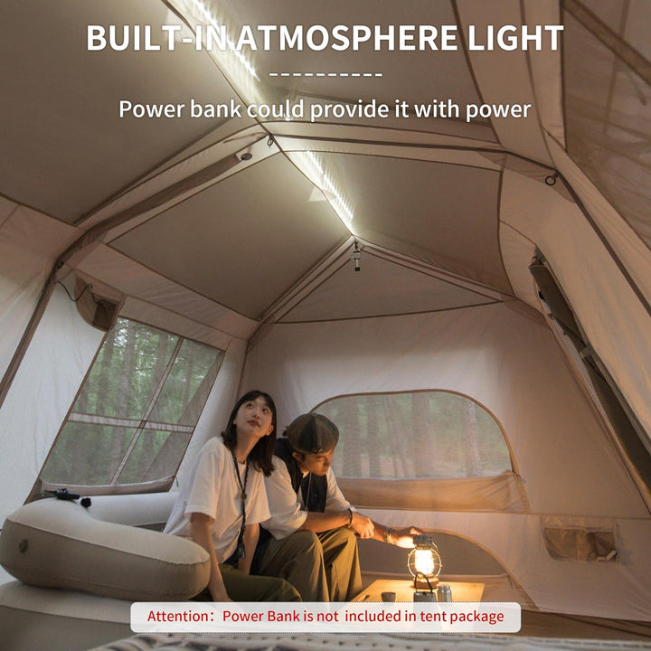 Naturehike Village 13 6-Person Automatic Cabin Tent interior view with built-in LED hanging light powered by a power bank, creating a cozy and well-lit family camping environment.
